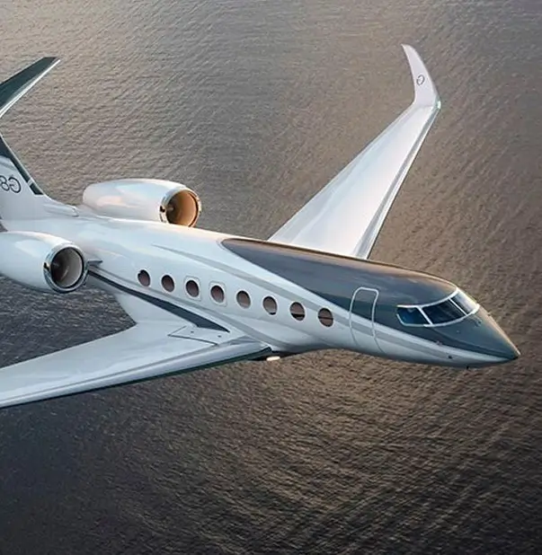 Private Jet Flying Over Water